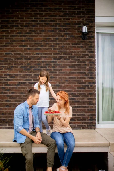 Family Mother Father Daughter Sitting Steps Front Porch Brick House — 图库照片
