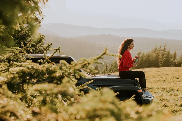 Pretty Young Woman Relaxing Terrain Vehicle Hood Countryside — Stock fotografie