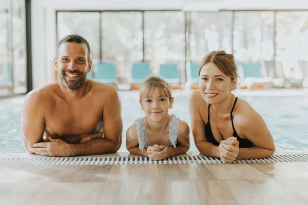 Family enjoy in the indoor swimming pool