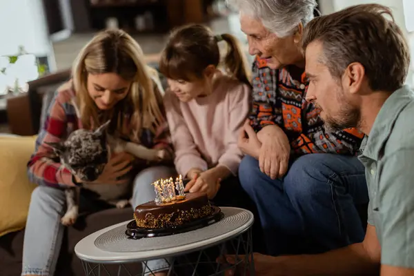 Heartwarming Scene Unfolds Multi Generational Family Gathers Couch Present Birthday Stock Photo