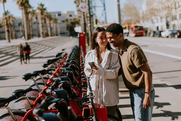 Young Pair Enjoying Breezy Day Choosing Bikes Rental Station Barcelona — Stock Photo, Image