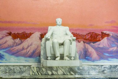 Pyongyang, North Korea - July 29, 2015: Statue of Kim Il-sung at the Grand People's Study House in Pyongyang, North Korea. It is the central library located in the North Korean capital, Pyongyang clipart