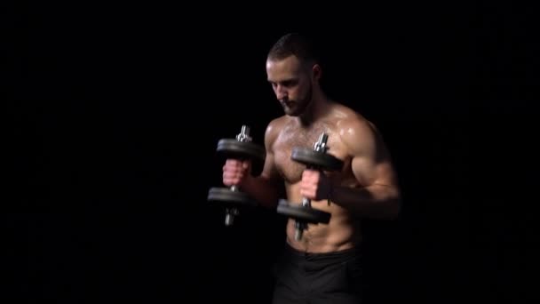 Strong Handsome Shirtless Sport Man Training Biceps Dumbbells Black Background — Stock videók