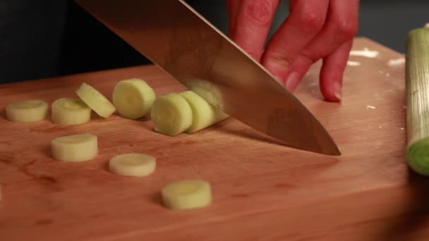 Woman Hands Cutting Leek Wooden Board Close — Stock Video