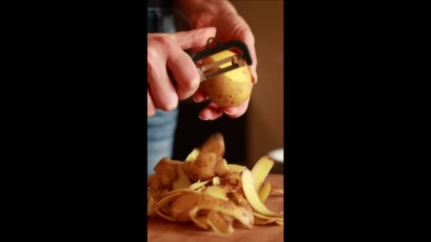 Man Hands Peeling Potatoes Home Close Vertical Video — Video
