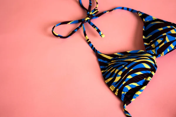 stock image close up swimwear in pink background shoot in studio no people