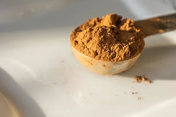 Metal Spoon Cacao Powder Close White Background — Stock Photo, Image