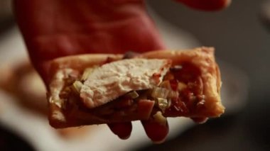 Close-Up Delight: Tart with Puff Pastry, Leek, Bacon, and Goat Cheese - Culinary Elegance