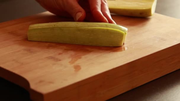 Close Stock Video Capturing Hands Woman Skillfully Chopping Zucchini Cubes — Stockvideo