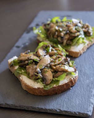  Toasted Bread with Ricotta, Arugula, and Mushrooms  Close-Up clipart