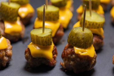 Delicious Cheeseburger Meatball Appetizer clipart