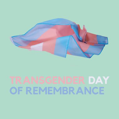 Yeşil arka planda dalgalanan bir transseksüel bayrağı ve kare biçiminde hatırlama metni transseksüel günü.