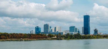 Vienna, Austria - August 28, 2022: A panoramic view of Donau City, also known as Vienna DC, in Vienna, Austria, next to the Danube river