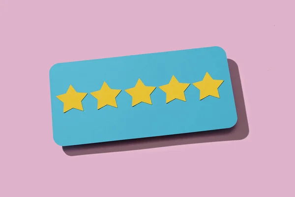 Closeup Blue Sign Five Stars Five Star Rating Scale Pink — Stock Photo, Image