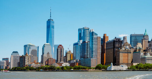 A view of the Financial District and Lower Manhattan, in New York City, United States, since the Hudson River, on a spring day