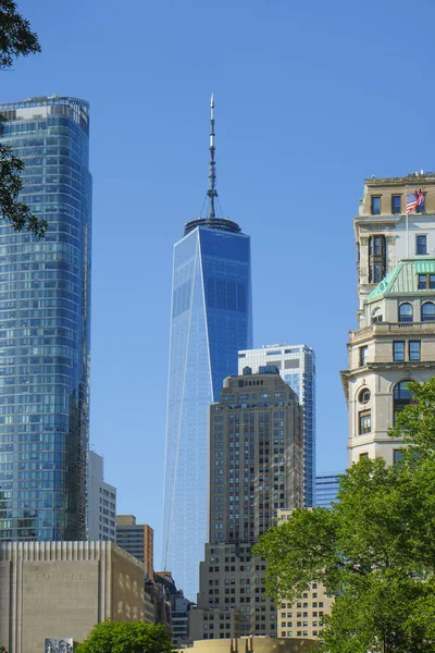 stock image New York City, United States - May 17, 2023: A view of 50 West building, left, and One World Trade Center, in the center,, in the Financial District of New York City, United States