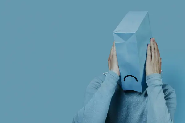 Closeup Man Blue Paper Bag His Head Sad Mouth Drawn — Stock Photo, Image