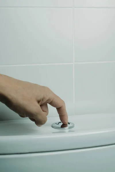 Man Flushes Toilet Pressing Button Tiled Bathroom Using — Stock Photo, Image