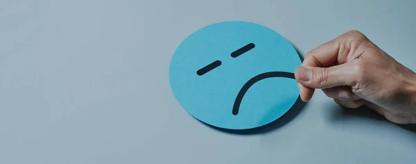 Man Putting Sad Mouth Blue Paper Face Gray Background Panoramic — Stock Photo, Image