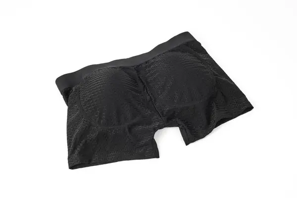 Detailní Záběr Pár Černých Boxerských Kalhotek Polstrováním Hýždí Bílém Pozadí — Stock fotografie