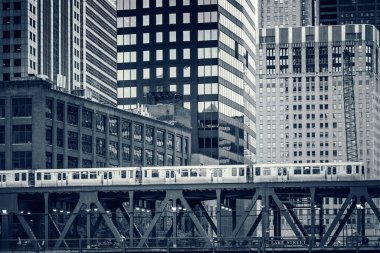 Black and white view of railway train in Chicago, USA.