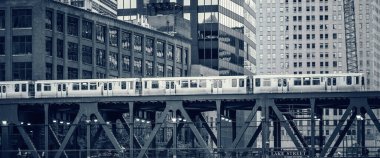 Black and white view of railway train in Chicago, USA.