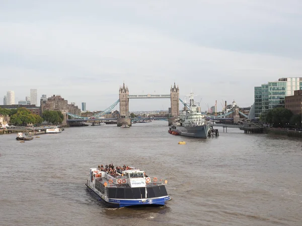 stock image LONDON, UK - CIRCA OCTOBER 2022: Panoramic view of River Thames including Tower Bridge and HMS Belfast ship