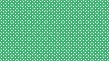 white polka dots pattern over medium sea green useful as a background