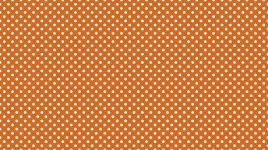 white polka dots pattern over chocolate useful as a background