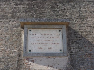 BRNO, CZECH REPUBLIC - CIRCA SEPTEMBER 2022: Memorial plaque for imprisoned Italians, translation From these gloomy coviles sanctified with martyrdom came out victorious the Italian redemption