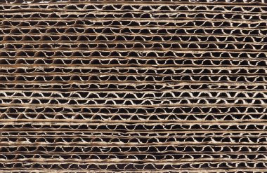 kahverengi kıvrımlı karton dokusu arka plan olarak kullanışlı