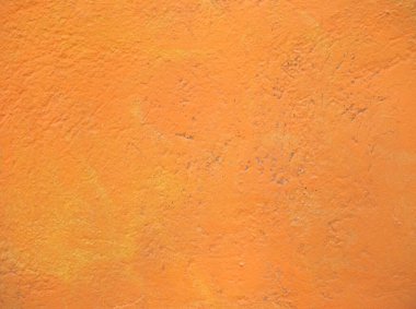 industrial style Orange Painted plaster wall texture useful as a background