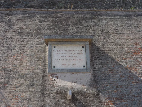 BRNO, CZECH REPUBLIC - CIRCA SEPTEMBER 2022: Memorial plaque for imprisoned Italians, translation From these gloomy coviles sanctified with martyrdom came out victorious the Italian redemption