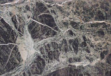 industrial style black marble texture useful as a background