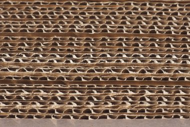 kahverengi kıvrımlı karton dokusu arka plan olarak kullanışlı