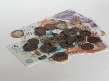 Pound coins and banknotes money currency of United Kingdom