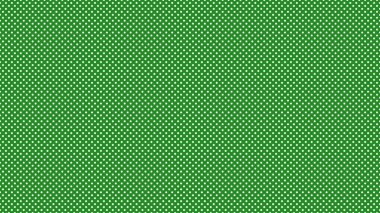 Beyaz benekli benekler orman yeşili üzerinde. Arka plan olarak kullanışlı.