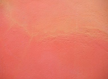 industrial style Orange Painted plaster wall texture useful as a background