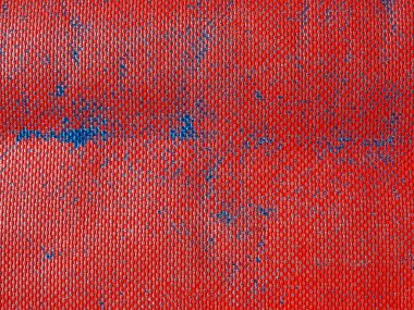 industrial style red plastic texture useful as a background