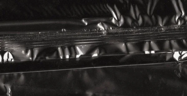 背景として有用な工業スタイルのグレーアルミ箔金属テクスチャ — ストック写真