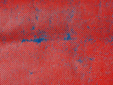 industrial style red plastic texture useful as a background