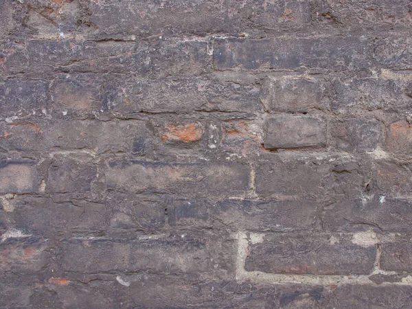 産業スタイル背景として有用な黒レンガの壁 — ストック写真