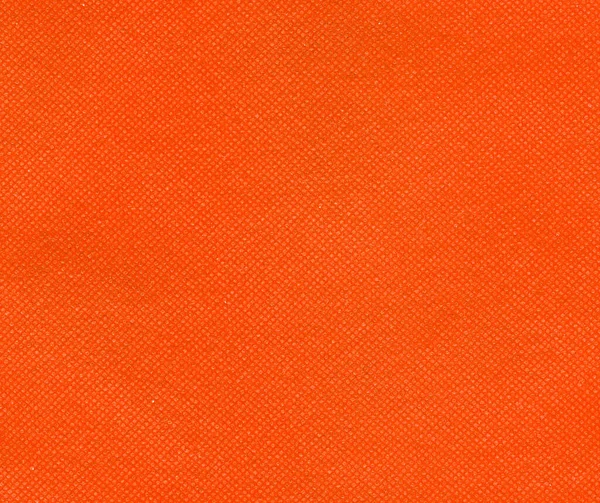 背景として有用な工業スタイルのオレンジ不織布ポリプロピレン — ストック写真