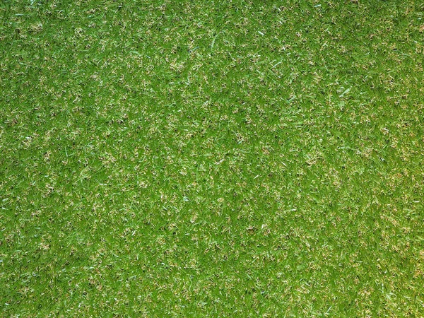 産業スタイル背景として有用な緑の人工合成草の牧草地のテクスチャ — ストック写真
