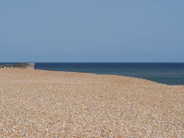 Sahilden görünen deniz doğal bir arka plan olarak kullanışlıdır.
