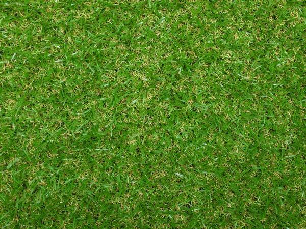 industrial style Green artificial synthetic grass lawn meadow useful as a background