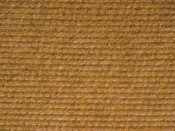industrial style brown wool fabric texture useful as a background