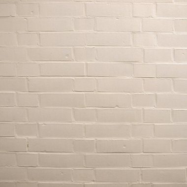 industrial style white brick wall useful as a background