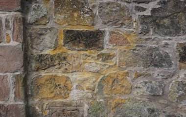 Kahverengi taş duvar arka plan olarak yararlı