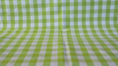 Arkaplan olarak kullanışlı yeşil ve beyaz kumaş dokusu